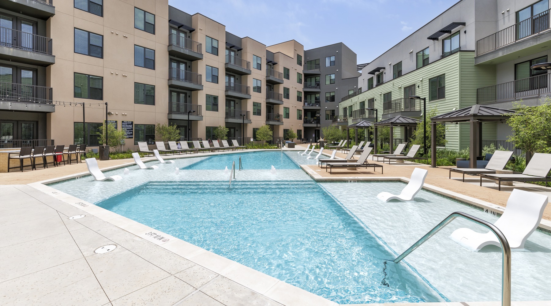 Sparkling pool at Rivette Tower apartments in Austin, TX. Sparkling pool at Rivette Tower apartments in Austin, TX.